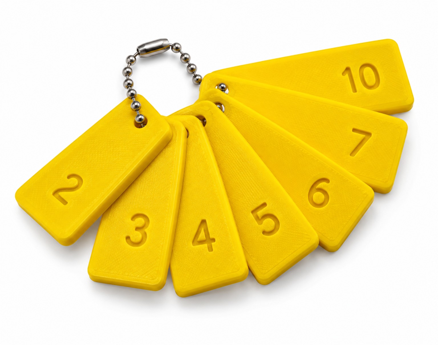 Yellow drawer-front spacer gauges labelled 2, 3, 4, 5, 6, 7 and 10mm